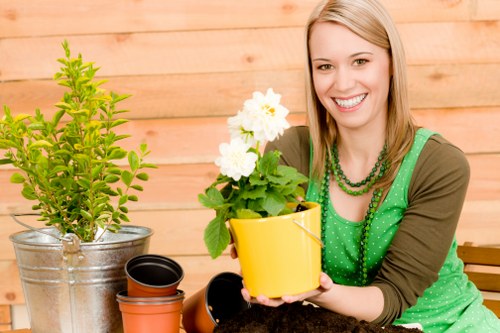 Operator performing a risk-aware gardening task