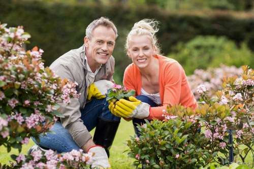 Canal-side garden clearance with man and van